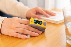 Biolight M70 Fingertip Pulse Oximeter on Finger